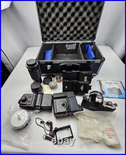 Vintage Nikon EM Film Camera With Hard Case And 16 Assorted Lens & Accessories