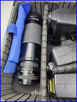 Vintage Nikon EM Film Camera With Hard Case And 16 Assorted Lens & Accessories