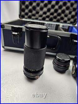 Vintage Nikon EM Film Camera With Hard Case And 16 Assorted Lens & Accessories