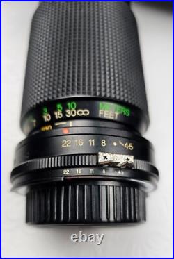 Vintage Nikon EM Film Camera With Hard Case And 16 Assorted Lens & Accessories