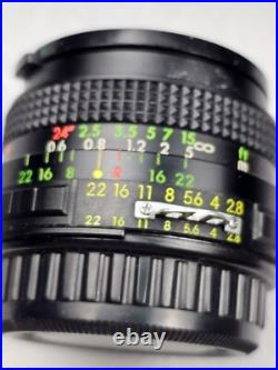 Vintage Nikon EM Film Camera With Hard Case And 16 Assorted Lens & Accessories