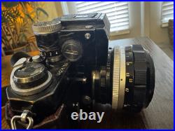 Vintage Nikon F camera with a NIKKOR-S Auto 11.2 f=55mm lens & Leather Case