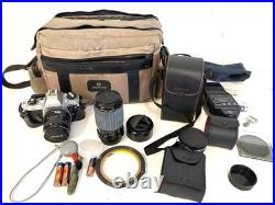 Vintage Nikon FG 35mm SLR Camera Outfit Lot with Lenses Sunpak & Accessories WORKS Vintage Nikon FG 35mm SLR Camera Outfit Lot with Lenses Sunpak & Accessories WORKS