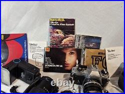 Vintage Nikon FG Camera Lot, extra lens, instruction books, flash, cases & FILM