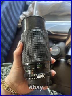 Vintage Nikon FG Camera With Lenses Untested