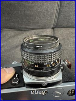 Vintage Nikon FM Camera With Quantaray 25mm 12.8 Lens And Filter