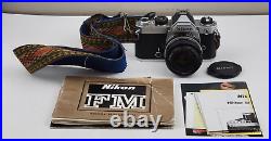 Vintage Nikon FM Chrome 35mm SLR Film Camera with Nikkor 50mm f/1.8 Lens + Manual