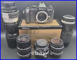 Vintage Nikon N2000 Film Camera with 5 Lens 55mm, 135mm, 300mm 80-200mm Nikkor