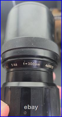 Vintage Nikon N2000 Film Camera with 5 Lens 55mm, 135mm, 300mm 80-200mm Nikkor