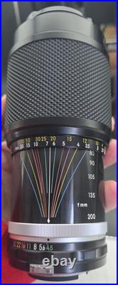 Vintage Nikon N2000 Film Camera with 5 Lens 55mm, 135mm, 300mm 80-200mm Nikkor