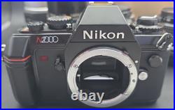 Vintage Nikon N2000 Film Camera with 5 Lens 55mm, 135mm, 300mm 80-200mm Nikkor