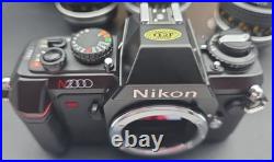 Vintage Nikon N2000 Film Camera with 5 Lens 55mm, 135mm, 300mm 80-200mm Nikkor