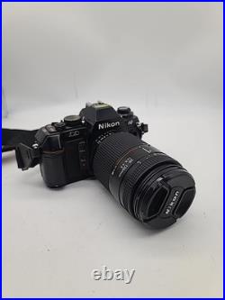 Vintage Nikon N2020 35mm SLR Camera With AF Nikkor 35-135mm Lens Works