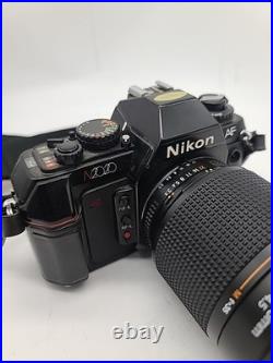 Vintage Nikon N2020 35mm SLR Camera With AF Nikkor 35-135mm Lens Works
