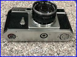 Vintage Nikon Sp Rangefinder Camera With 50mm F1.4 Lens And Case