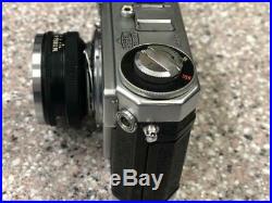 Vintage Nikon Sp Rangefinder Camera With 50mm F1.4 Lens And Case