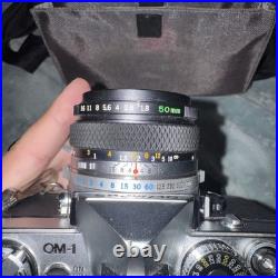 Vintage Olympus OM-1 35mm Film Camera with 50mm f/1.8 Lens, Extras, Bundle Vintage Olympus OM-1 35mm Film Camera with 50mm f/1.8 Lens, Extras, Bundle