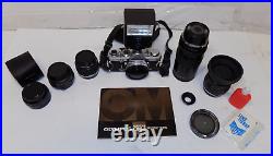 Vintage Olympus OM-1 MD 35mm Film Camera Bundle with Base 4 Lens Manual and More