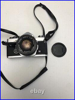 Vintage Olympus OM-1 film camera with 50mm lens