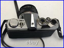 Vintage Olympus OM-1 film camera with 50mm lens