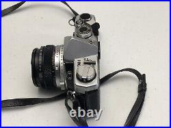 Vintage Olympus OM-1 film camera with 50mm lens