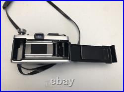 Vintage Olympus OM-1 film camera with 50mm lens