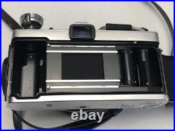 Vintage Olympus OM-1 film camera with 50mm lens