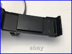 Vintage Olympus OM-1 film camera with 50mm lens