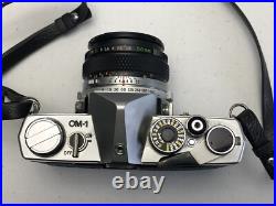 Vintage Olympus OM-1 film camera with 50mm lens