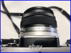 Vintage Olympus OM-1 film camera with 50mm lens