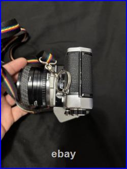 Vintage Olympus OM-10 35mm Camera with extra lens and accessories and bag