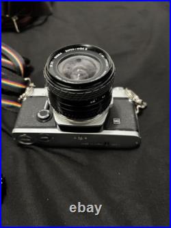 Vintage Olympus OM-10 35mm Camera with extra lens and accessories and bag