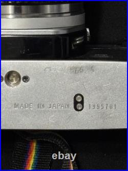 Vintage Olympus OM-10 35mm Camera with extra lens and accessories and bag