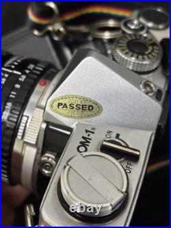 Vintage Olympus OM-10 35mm Camera with extra lens and accessories and bag