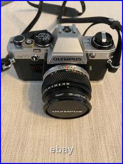 Vintage Olympus OM-10 35mm Film Camera with 50mm Lens Vintage Olympus OM-10 35mm Film Camera with 50mm Lens