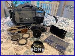 Vintage Olympus OM-10 SLR Camera With flash, 3 Lens, 2 Cases, lens hood & manual