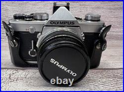 Vintage Olympus OM-1n 35mm Film Camera with Vivitar 28 mm, 75-150 mm, Metal Case