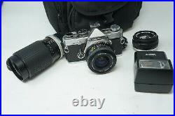 Vintage Olympus OM-2 OM2 Film SLR Camera & 28mm 50mm and 75-150mm lenses