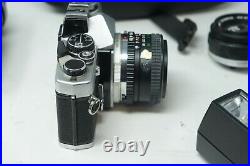 Vintage Olympus OM-2 OM2 Film SLR Camera & 28mm 50mm and 75-150mm lenses