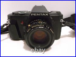 Vintage P3N Pentax SLR Camera 35MM withmultiple lens/filters/case/manual c. 1988