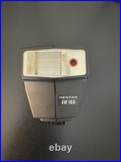 Vintage PENTAX MG 35mm SLR film camera 50mm 12 Wide Angle Zoom Lens AF160 Flash