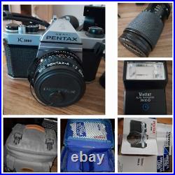 Vintage Pentax K1000 35mm film camera with bag, flash attachement, and zoom lens Vintage Pentax K1000 35mm film camera with bag, flash attachement, and zoom lens