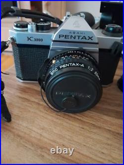 Vintage Pentax K1000 35mm film camera with bag, flash attachement, and zoom lens Vintage Pentax K1000 35mm film camera with bag, flash attachement, and zoom lens