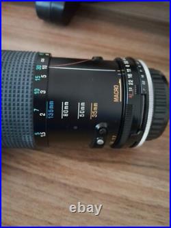 Vintage Pentax K1000 35mm film camera with bag, flash attachement, and zoom lens Vintage Pentax K1000 35mm film camera with bag, flash attachement, and zoom lens