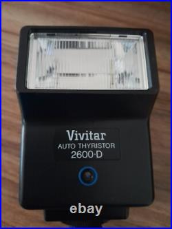 Vintage Pentax K1000 35mm film camera with bag, flash attachement, and zoom lens Vintage Pentax K1000 35mm film camera with bag, flash attachement, and zoom lens