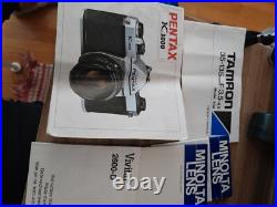 Vintage Pentax K1000 35mm film camera with bag, flash attachement, and zoom lens