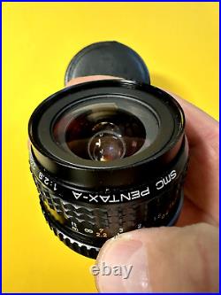 Vintage Pentax SMC Pentax-A 24mm 12.8 camera lens with caps + original hard case