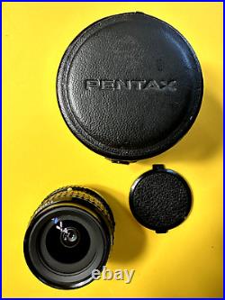 Vintage Pentax SMC Pentax-A 24mm 12.8 camera lens with caps + original hard case