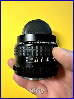 Vintage Pentax SMC Pentax-A 24mm 12.8 camera lens with caps + original hard case