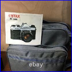 Vintage Pentax k1000 35mm slr film camera With 4 Lens, 2 Flashes Manual And Bag